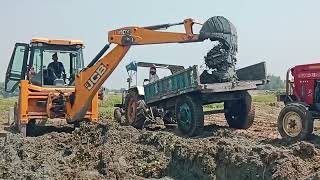 jcb 3dx eco loading in swaraj tractor ! tractor video ! jcb video #jcb #tractor #viral