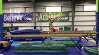 Beam- Back handspring layout split jump