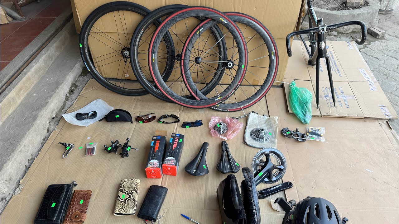 10/1-2 cặp vành cacbon rất đẹp,sườn bianchi và nhiều phụ kiện xe đạp thể thao cao cấp 