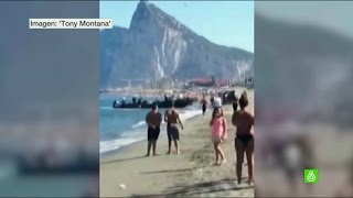 Graban a unos narcos descargando droga en la playa a plena luz del día