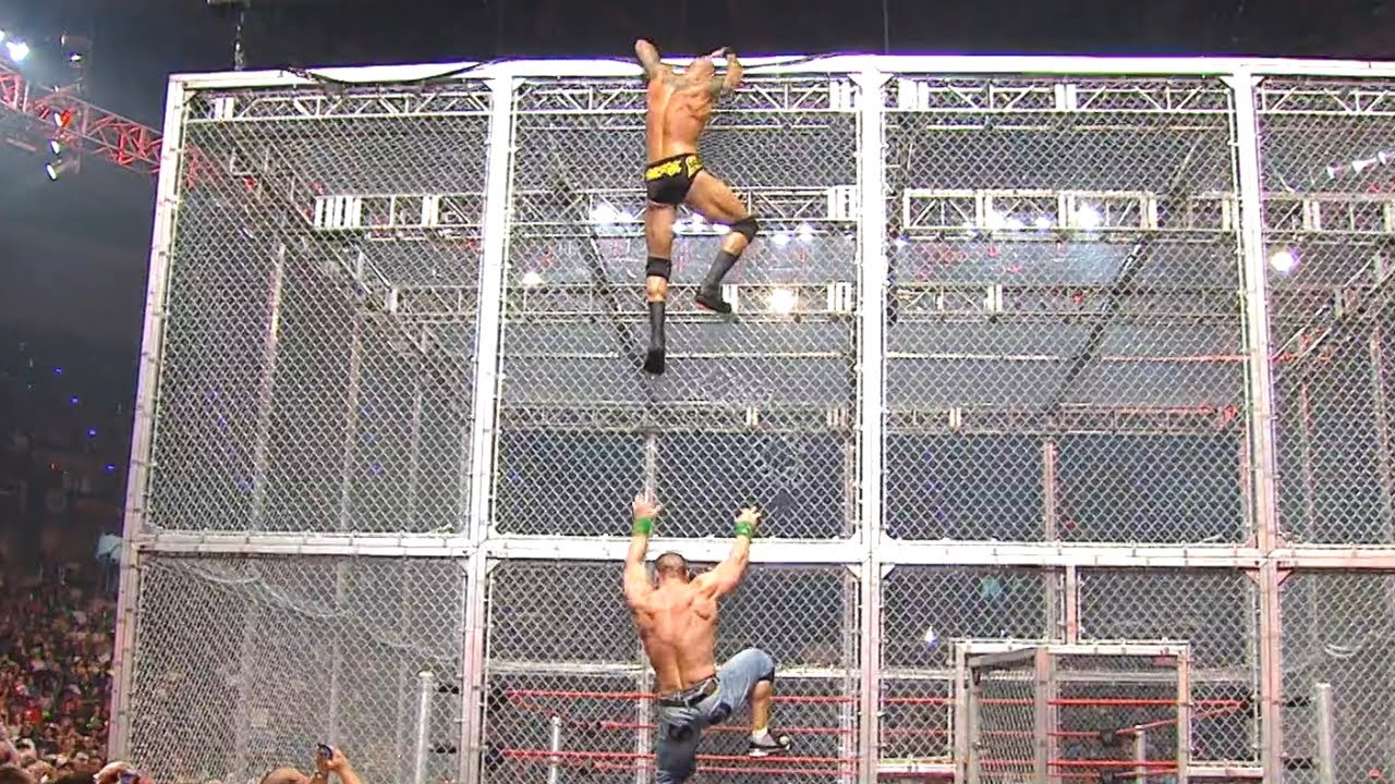 John Cena and Randy Orton brawl on top of the Hell in a Cell: Raw, Sept. 28, 2009