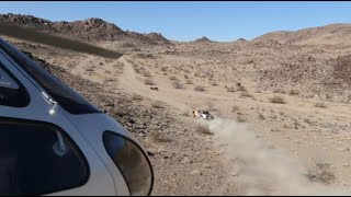 DJI Mavic 2 Zoom drone vs Aerospatiale AS350BA during off-road truck race near Johnson Valley, CA