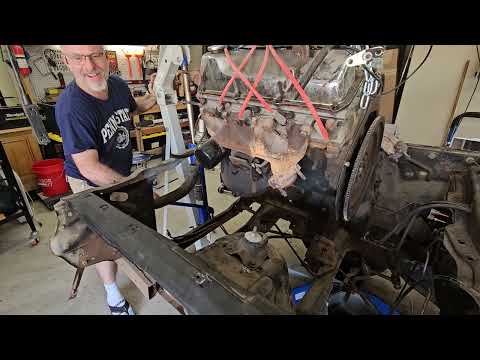 73 Mustang pulling the engine.  Out it comes.  