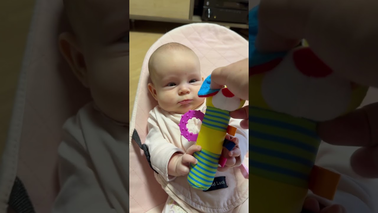 I learned how to use my hands to grab things like toys and Papa’s hand when he helps me fall asleep.