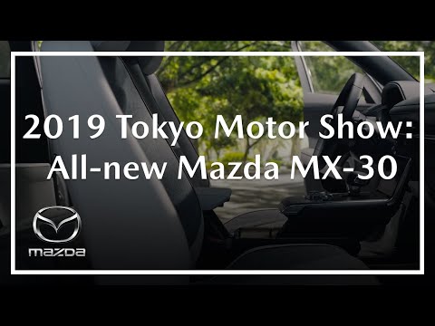 Mazda President unveils the MX-30 BEV at the 2019 Tokyo Motor Show