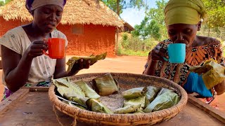 African Village Family Cooks Pumpkin Bread With Lemon Grass Tea For Breakfast