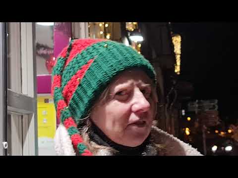 Gary & Kieran O Malley sing the Green and Red of Mayo on the Mall, Westport. 18.12.2020