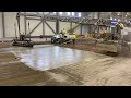 Schwing loop belt screed and spreader