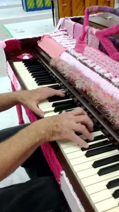 Yarnbombed piano - Tim playing classical