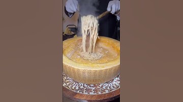 Thumbnail of Flaming cheese wheel carbonara pasta from Nonna Ina in St. George, Utah! #pasta #food #foodie