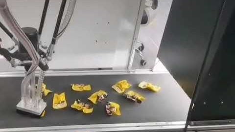 Automatic robot hand sorting system for bag sachet pouch