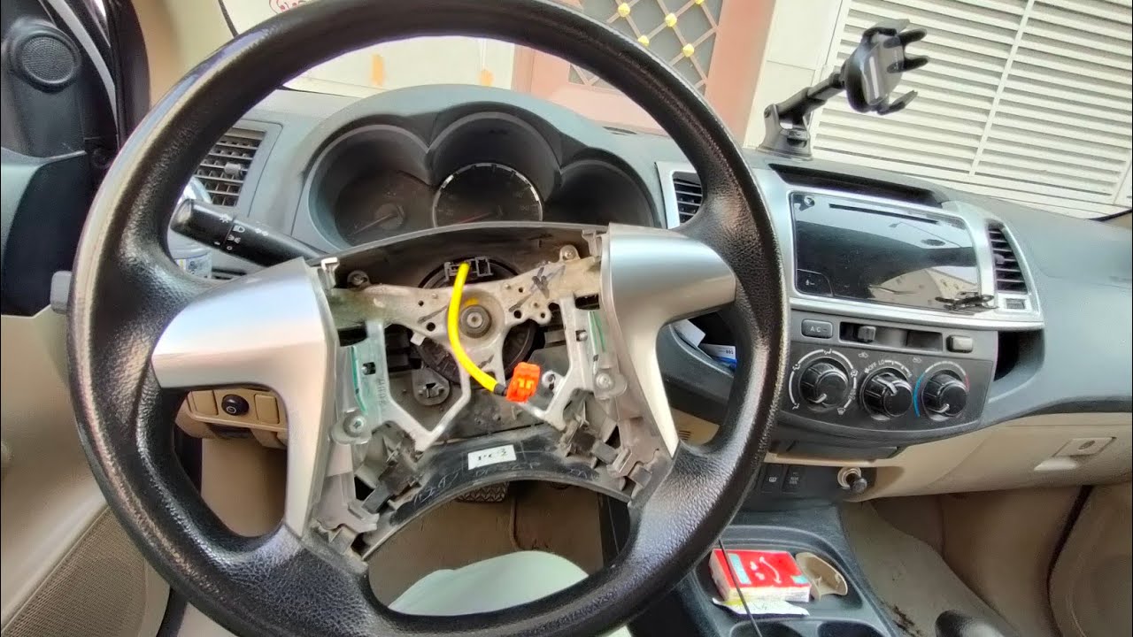 Toyota Fortuner steering wheel airbag removal.. طريقه فك كبسوله ايرباج تويوتا فورتشنر YouTube