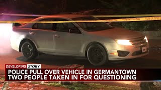 2 questioned by police as search continues for escaped murder suspect