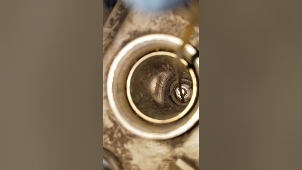 How to remove Boken coil pack rubber boot in spark plug chamber removal