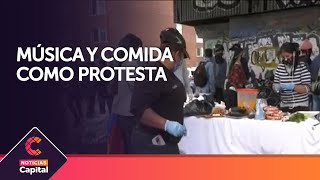 Comida y música en el monumento a Los Héroes