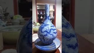 Blue and white porcelain sea nine dragon pattern gall bottle.