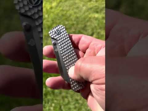 QSP Penguin exclusive with M390 steel & jigged Ti scales from traditionalpocketknives.com