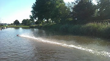 rc boat crackerbox 30cc engine and new exhaust (faster!!)