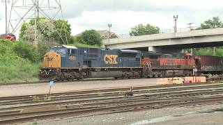 CSX SD80MAC on an empty BNSF grain train