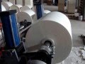 Reel paper sheet cutting machine with automatic stacking