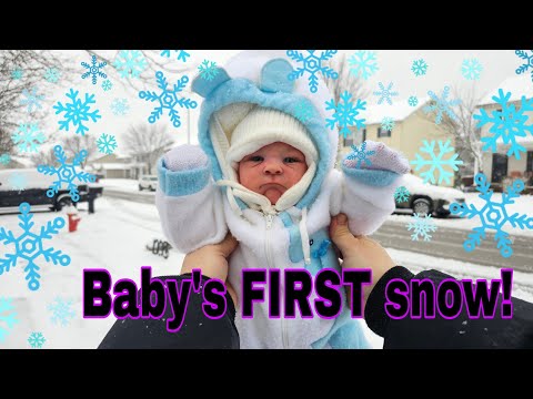 Reborn baby plays in the snow Reborn baby plays in the snow