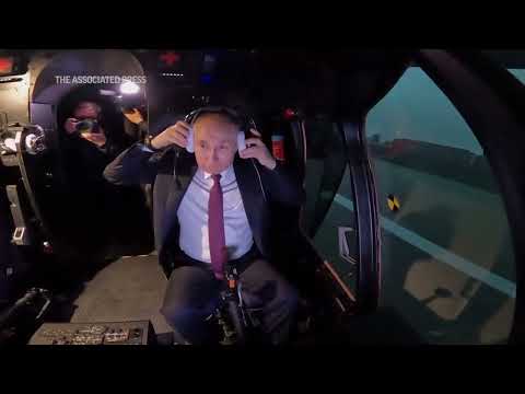 Putin visits helicopter factory in Siberia