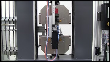 Fully Automated Tensile Testing System for Rebars