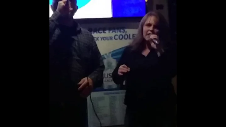 Adam and Renee Steele sing karaoke. 'Bright eyes'.