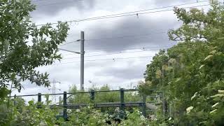 A Greater Anglia pair class 317 chugging through the bridge
