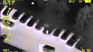 Suspect Caught Hiding under SUV