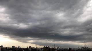 Overcast sky with city