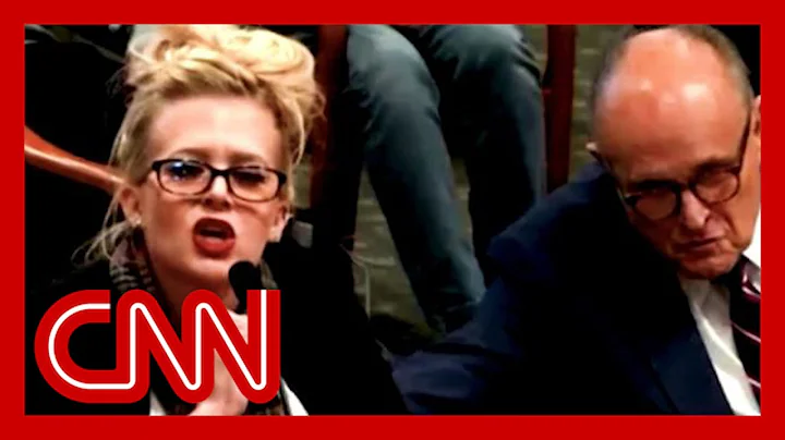 Giuliani's witness draws audible laughter during t...