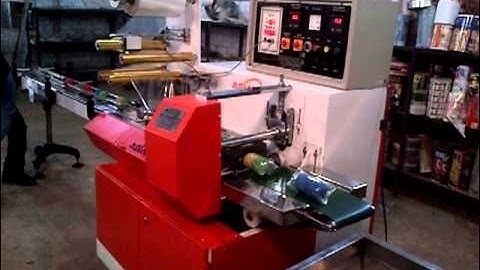 HORIZENTAL FLOW WRAP MACHINE
