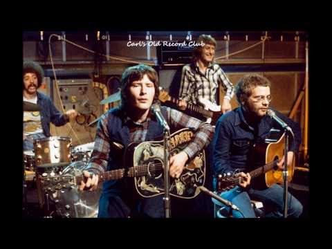 stealers-wheel-~-stuck-in-the-middle-with-you-(1972)