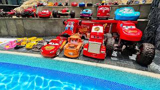 Disney Pixar Cars falling into deep pool, Lightning McQueen, Tow Mater, Mack, Sally, Francesco