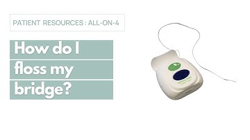 How do I floss my bridge?