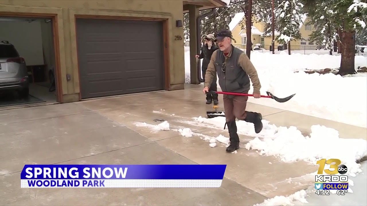 Woodland Park residents dig themselves out after spring snowstorm - YouTube