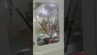 Automatic robot hand wet tissue bag cover lid feeding machine with gluing system