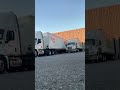 Docking tractor trailer between two (front view)