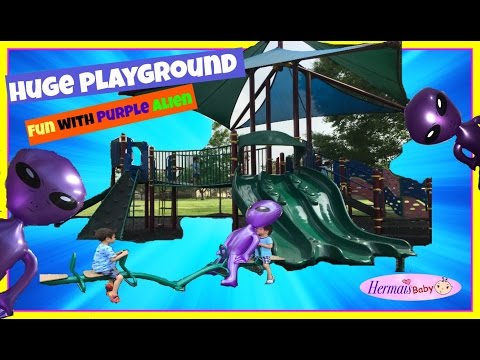 huge-outdoor-park-playground-for-children-giant-seesaw,-monkey-bar,-swing,-slide-purple-alien