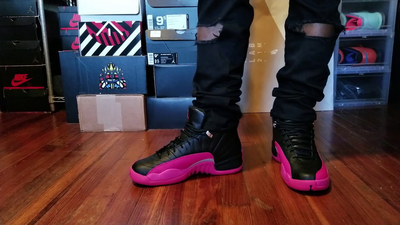 pink black jordan 12