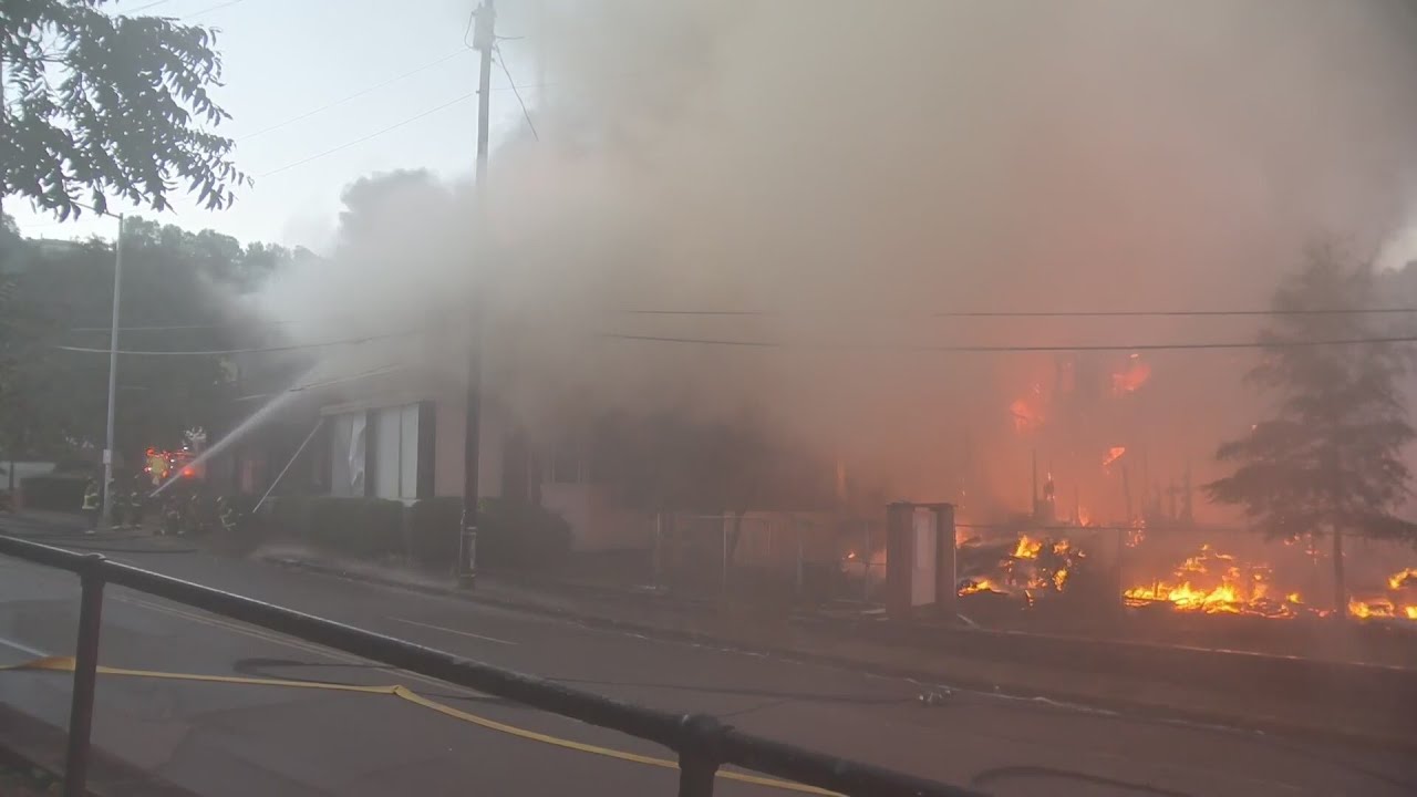 Crews battle large fire in Five Points South - YouTube