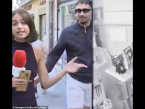 Shocking moment TV journalist is groped by creep who grab her behind as she report live from Madrid