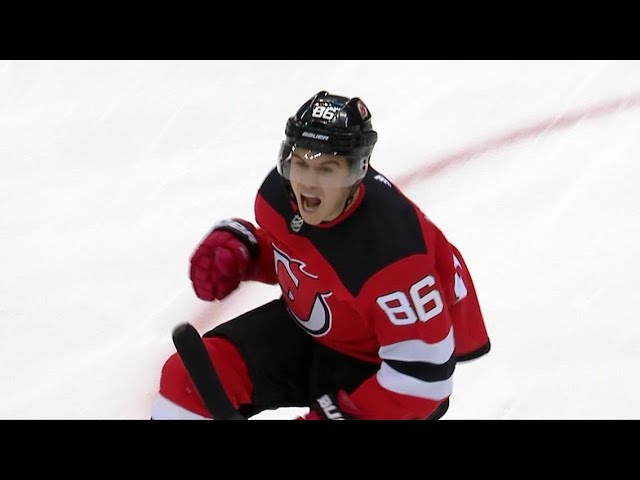 Devils' Jack Hughes gets 1st NHL goal with brother, family watching - ESPN