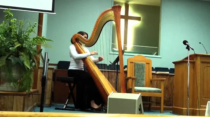 Victoria plays harp