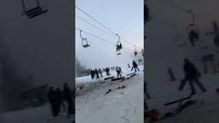 Ski lift stuck over burst pipe with skiers getting super wet in the cold winter weather!