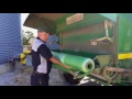 Loading NetWrap in a John Deere Baler