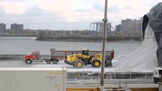 KOMATSU LOADING SALT INTO STERLING DUMP TRUCK