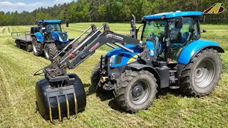 Grasernte 2023 gewickelte Rundballen verladen New Holland Traktoren &amp; Presse - Futter für Milchkühe