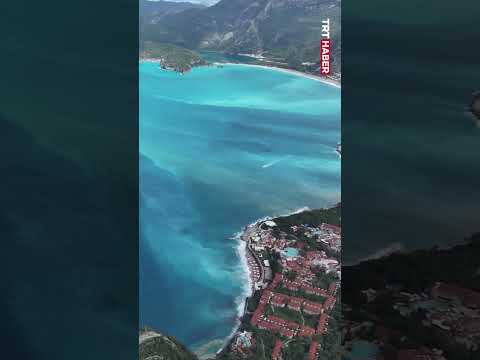 Ölüdeniz, sağanağın ardından turkuaza büründü